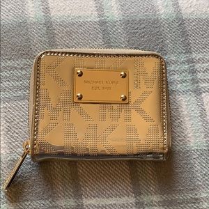 Michale kors gold logo wallet.